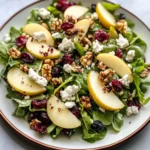 Pear walnut salad with cranberries and goat cheese